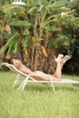 Woman lounging in the tropics