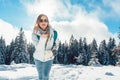 Woman loving her winter hike in the mountains