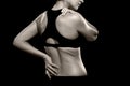 Woman with Lower Back and Shoulder Pain Royalty Free Stock Photo