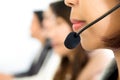 Woman lower face with microphone headset in call center