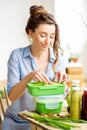 Woman with lunch boxes Royalty Free Stock Photo