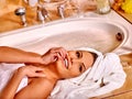 Woman luxuriate at home bath
