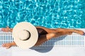 Woman in luxury five stars  spa resort in the pool Royalty Free Stock Photo