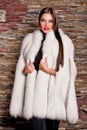 Woman in Luxury white Fur Coat Royalty Free Stock Photo