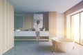 Woman in luxury wooden bathroom Royalty Free Stock Photo