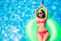 Woman lying on air mattress in swimming pool Royalty Free Stock Photo