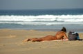 Woman lying on the beach Royalty Free Stock Photo