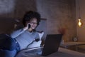 Woman lying in bed having a phone conversation Royalty Free Stock Photo