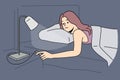 Woman lying in bed turn off lights