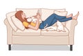 Woman lying comfortably on the sofa playing with her phone with her cat in the living room at home on white background Royalty Free Stock Photo