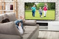 Woman Watching Television Royalty Free Stock Photo