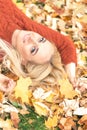 Woman lying down on yellow leaves Royalty Free Stock Photo