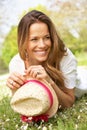 Woman Lying In Field Of Summer Flowers Royalty Free Stock Photo