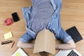 woman lying on floor with mobile phone, notebook and laptop Royalty Free Stock Photo