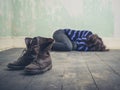 Woman lying on floor woth boots Royalty Free Stock Photo