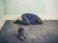 Woman lying on floor woth boots Royalty Free Stock Photo