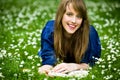 Woman lying on grass with book Royalty Free Stock Photo