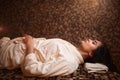 Woman lying on a hot stone, turkish hamam, sauna Royalty Free Stock Photo