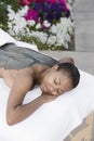 Woman Lying On Massage Bed With Mud Pack Applied On Back Royalty Free Stock Photo