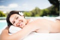 Woman lying on massage table with salt scrub on back Royalty Free Stock Photo