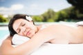 Woman lying on massage table with salt scrub on back Royalty Free Stock Photo