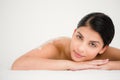 Woman lying with salt scrub on the back Royalty Free Stock Photo