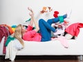 Woman lying on sofa, pelted clothes Royalty Free Stock Photo