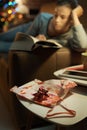 Woman reading a book she received as gift Royalty Free Stock Photo