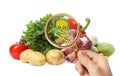 Woman with magnifying glass detecting microbes on white background. Food poisoning concept