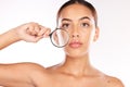 Woman, magnifying glass and skincare portrait for beauty wellness or healthy facial care in studio. Model face, Luxury