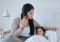 Woman make phone call, sick child in bed sleeping with covid or virus in home. Mom fear for kid healthcare, contact Royalty Free Stock Photo