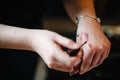 A woman, make-up artist, tests a sample of lipstick on her hand, selects different new colors for makeup. cosmetics. Testing lip Royalty Free Stock Photo