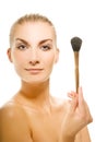 Woman with a make-up brush