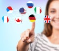 Woman makes choice about flag Royalty Free Stock Photo
