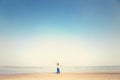 Woman makes meditation exercises facing the sea