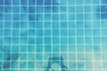 Woman makes pictures of palm trees reflection in the turquoise pool. Multipurpose backdrop