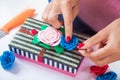 Woman makes a striped casket Royalty Free Stock Photo