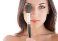 Woman with makeup brush