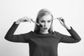 Woman with makeup brushes on face applying powder and shadow Royalty Free Stock Photo