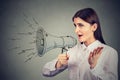 Woman making announcement with megaphone Royalty Free Stock Photo