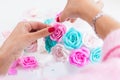 Woman making artificial rose Royalty Free Stock Photo