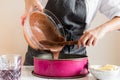 Woman making cake in her kitchen Royalty Free Stock Photo