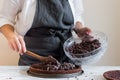 Woman making cake in her kitchen Royalty Free Stock Photo