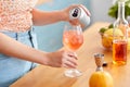 woman making cocktail drinks at home kitchen Royalty Free Stock Photo