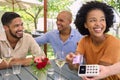 Woman Making Contactless Payment At Outdoor Bar Or Restaurant Using Credit Or Debit Card Royalty Free Stock Photo