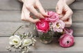 Woman making floral wedding decorations