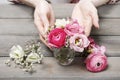 Woman making floral wedding decorations