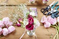 Woman making floral wedding decorations