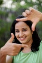 Woman making frame with her hands Royalty Free Stock Photo