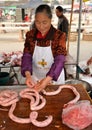 Woman Making Fresh Pork Sausage